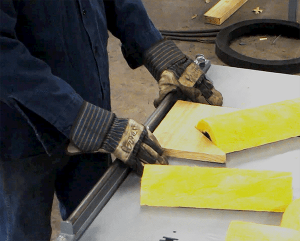 Should I wear gloves when using a bandsaw?